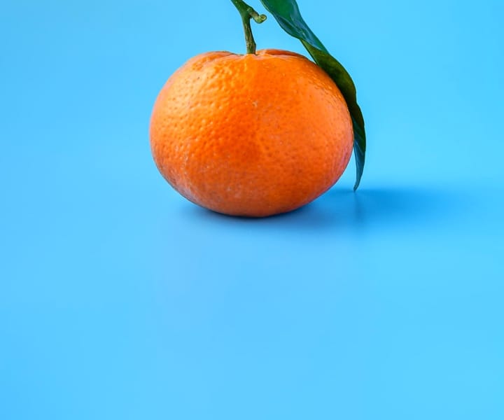 orange on blue background
